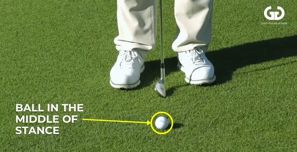 Golf ball placed in the middle of the stance